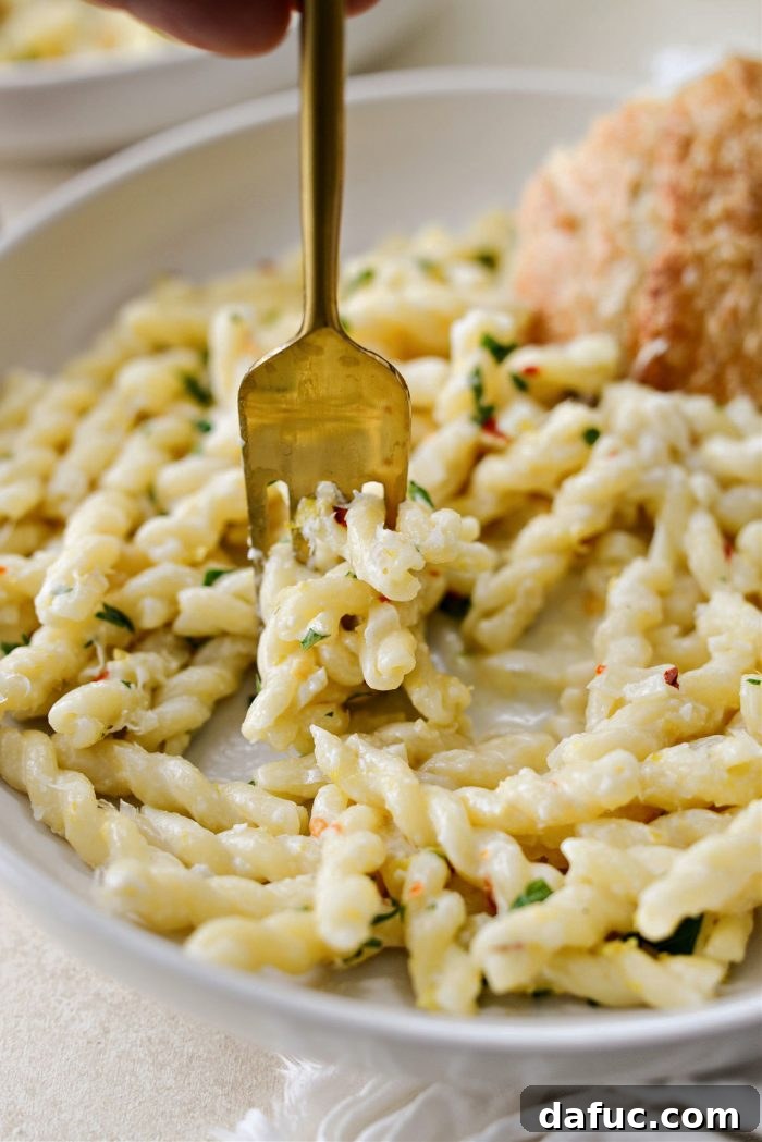 Velvety Lemon Parmesan Pasta 20 Creamy Lemon Parmesan Pasta garnished with fresh parsley