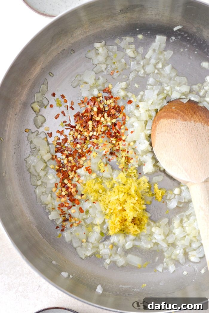Velvety Lemon Parmesan Pasta 9 Sautéed onions, garlic, red pepper flakes, and lemon zest in a skillet