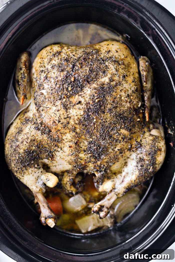 Fall-Off-The-Bone Slow Cooker Chicken 11 Slow cooker whole chicken with a golden, crispy skin