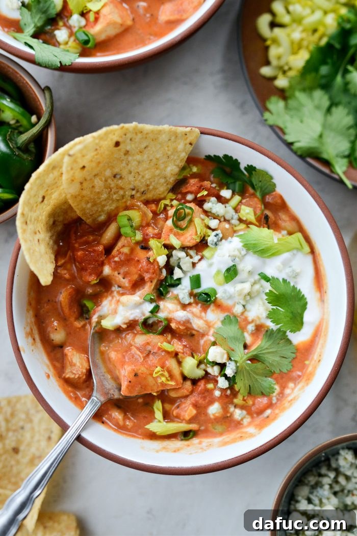 Zesty Buffalo Chicken Chili 21 Final presentation of Buffalo Chicken Chili in a rustic setting