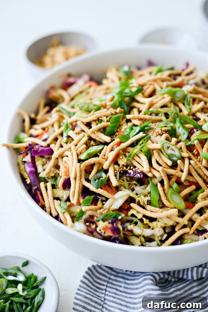 Crunchy Asian Chicken Salad 12 Serving bowl of Chinese Chicken Salad with additional garnishes on the side for customization