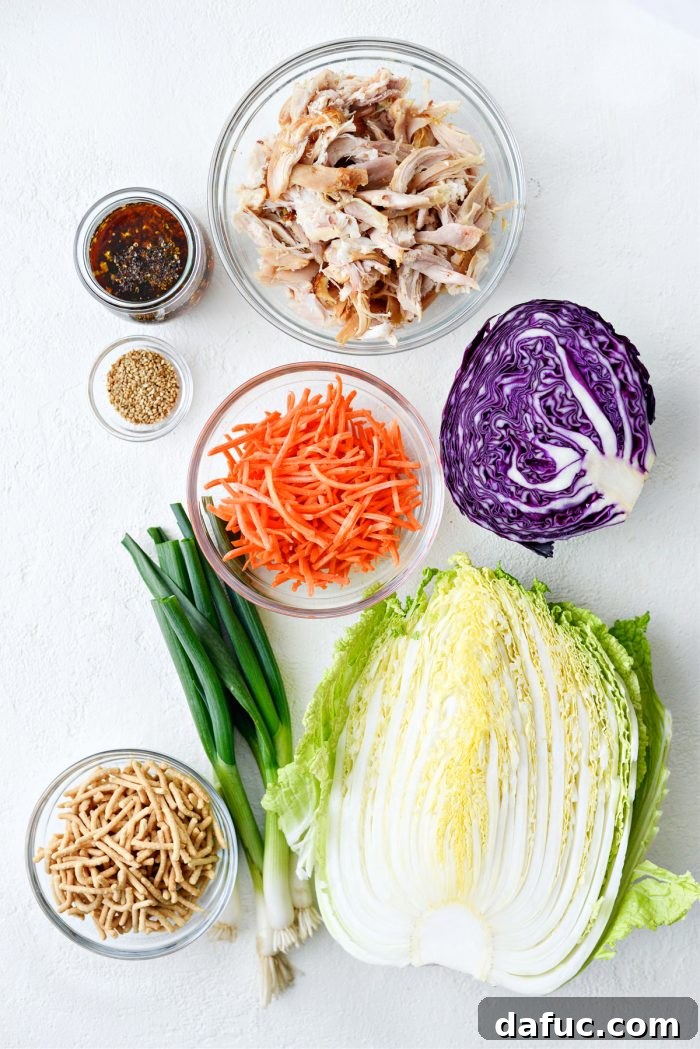 Crunchy Asian Chicken Salad 4 Assortment of fresh ingredients laid out for Chinese Chicken Salad preparation