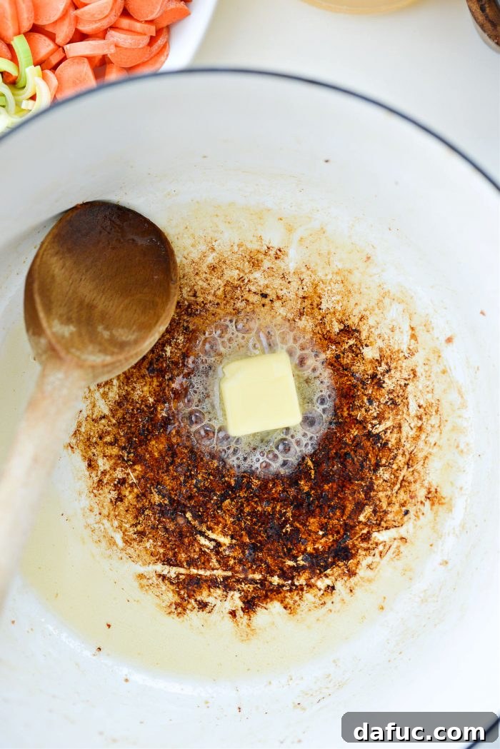 Add butter to Dutch oven