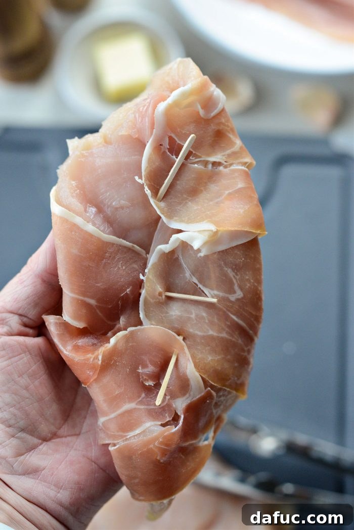 Securing prosciutto-wrapped chicken with toothpicks