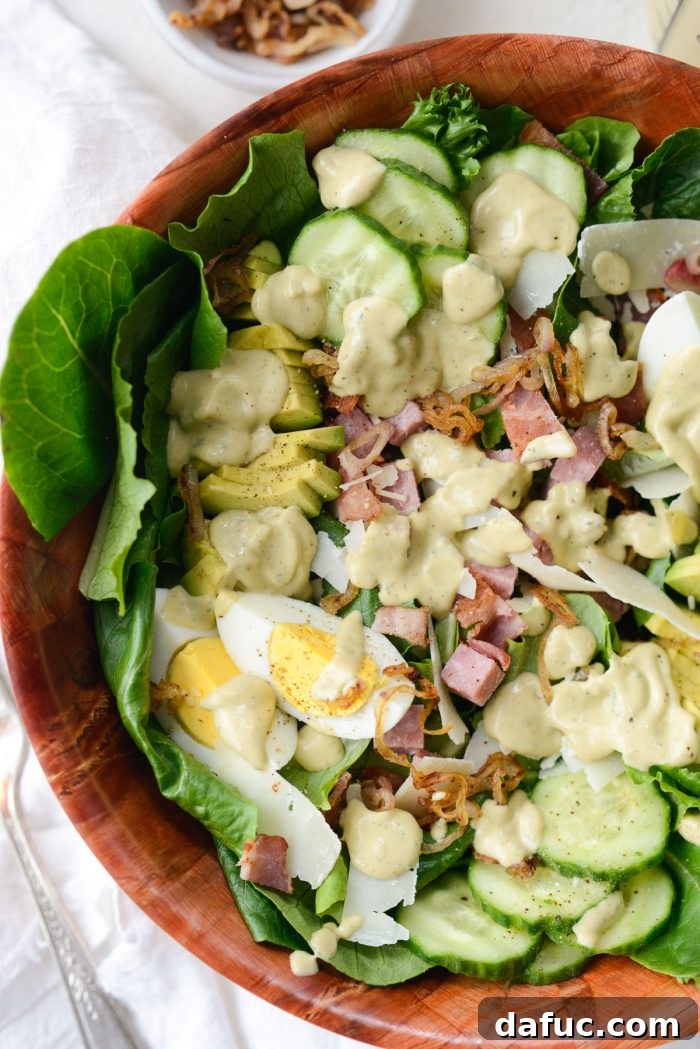 Freshly prepared Shoreline Salad with creamy avocado ranch dressing