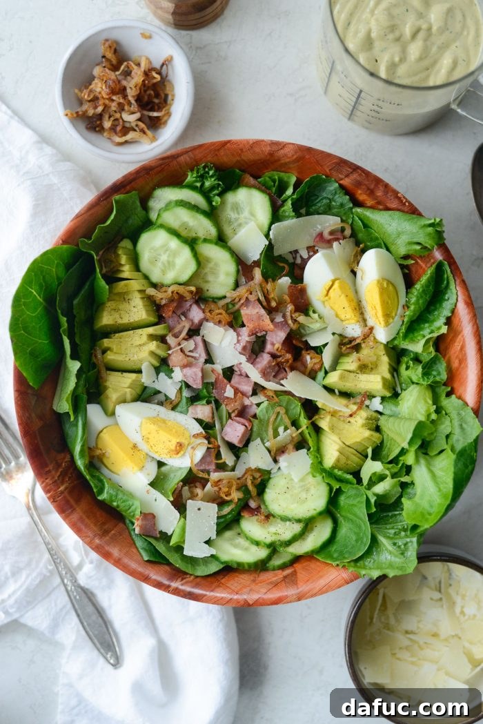Dividing salad greens into bowls