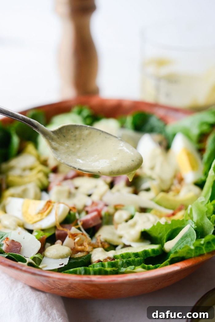 Adding various toppings to a salad bowl