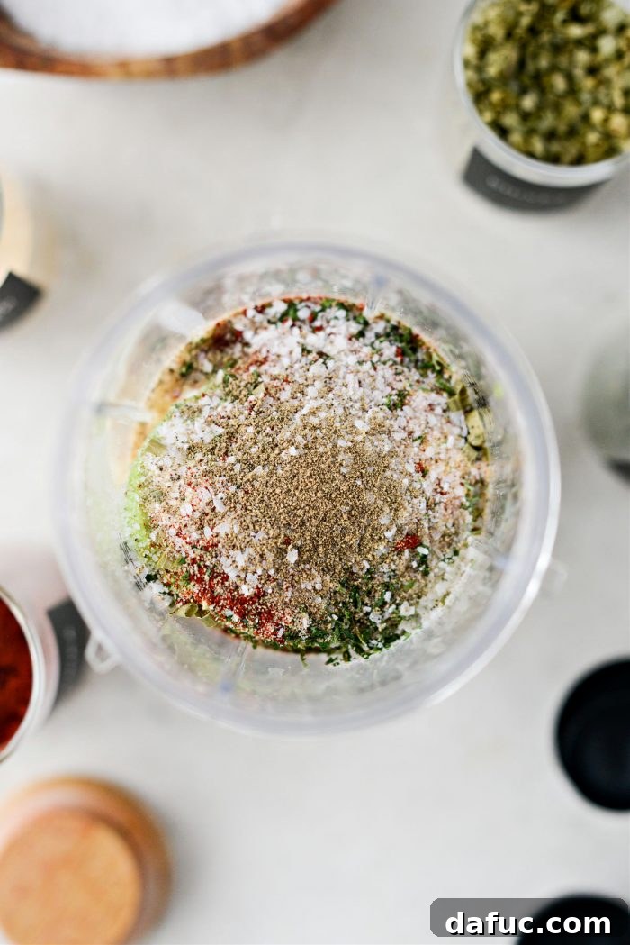 Measuring ingredients for avocado ranch in a blender