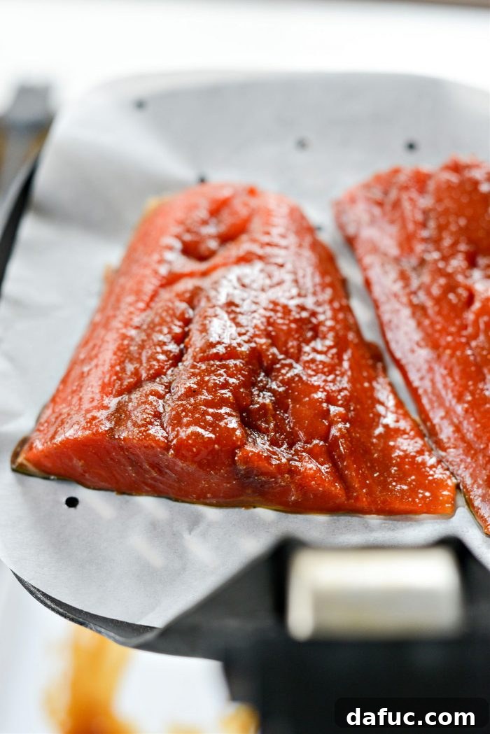 Perfectly air-fried Sriracha Salmon with a crispy skin