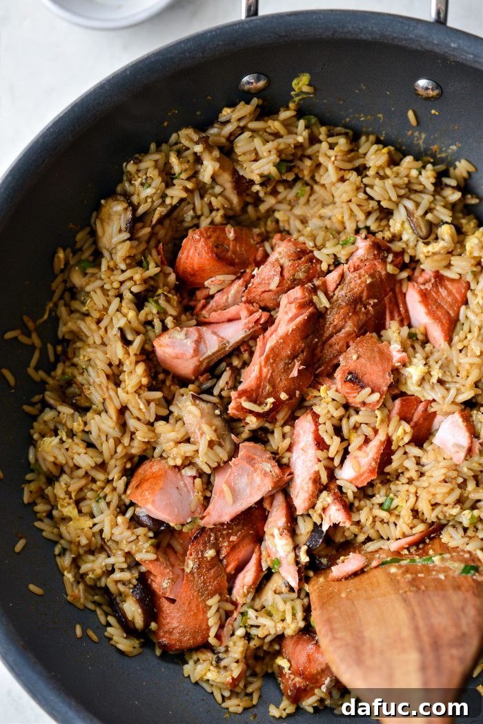 Golden Salmon Fried Rice 18 break up the salmon with a spatula