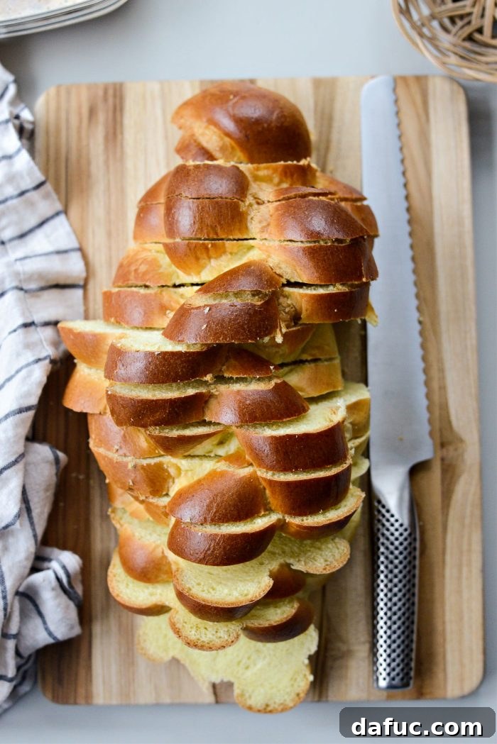 Caramelized Brown Sugar Baked French Toast 13 Sliced challah bread on a cutting board
