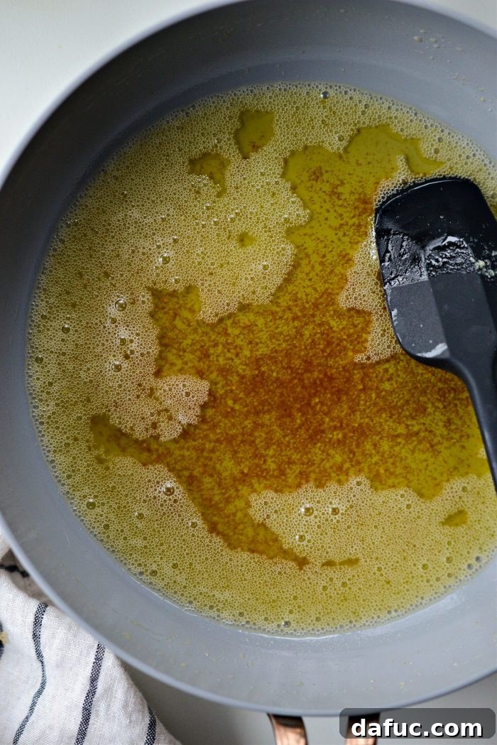 Caramelized Brown Sugar Baked French Toast 5 Unsalted butter browning in a saucepan