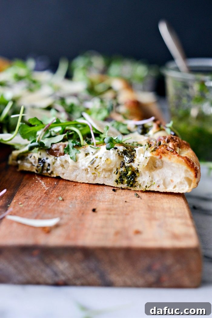 Another enticing view of the Green Forest Pizza, highlighting its fresh ingredients