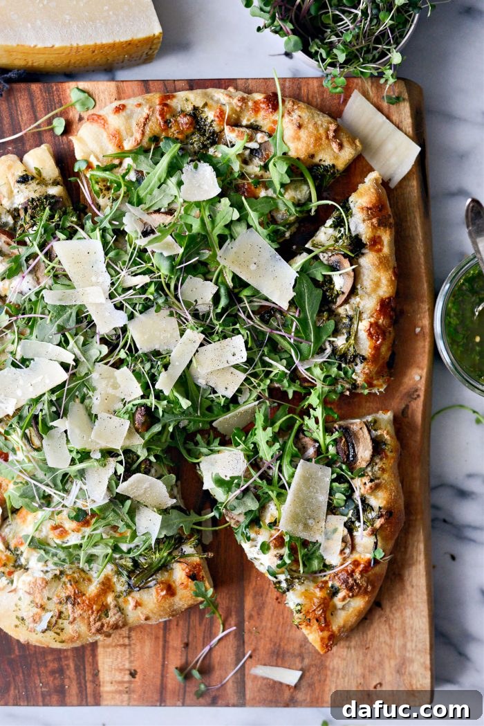 A final, mouth-watering shot of the Green Forest Pizza ready to be enjoyed