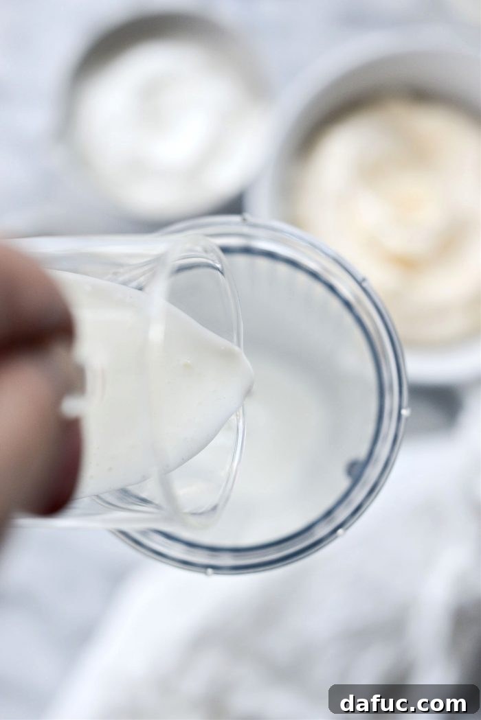 pouring buttermilk into a mini blender