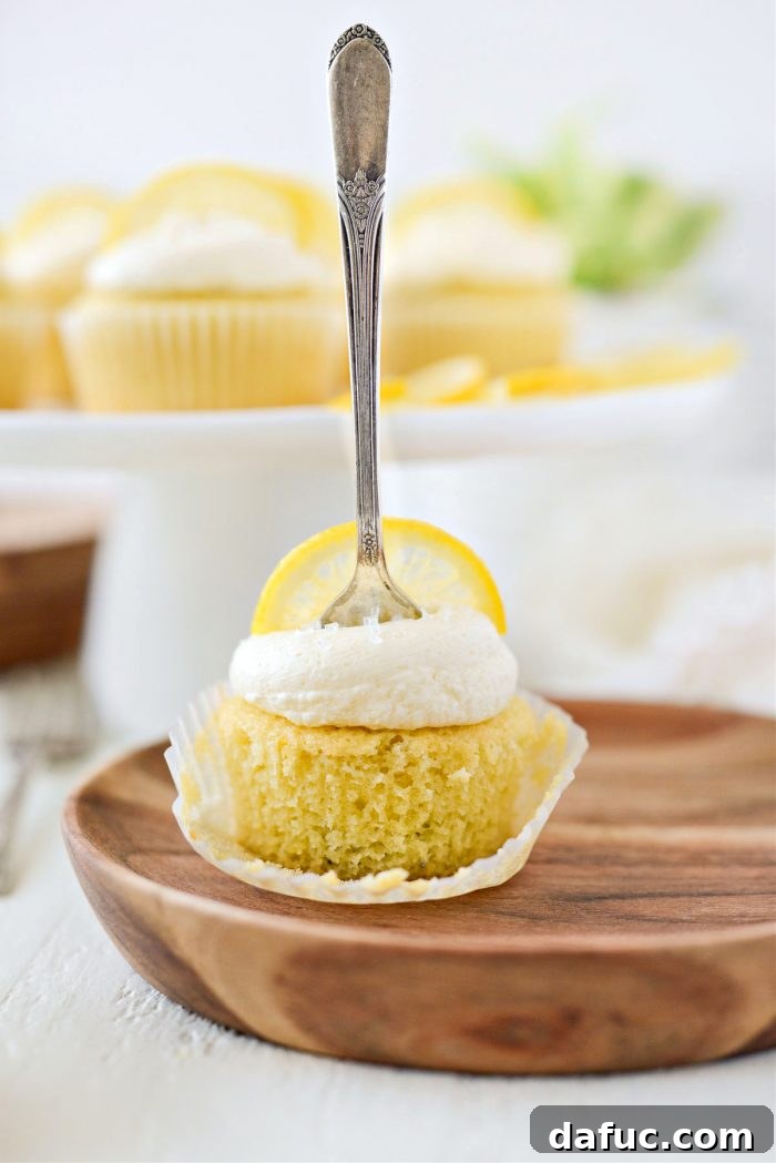 Tangy Lemon Cupcakes with Velvety Frosting 21 A beautifully arranged platter of lemon cupcakes with lemon buttercream frosting, ready to serve