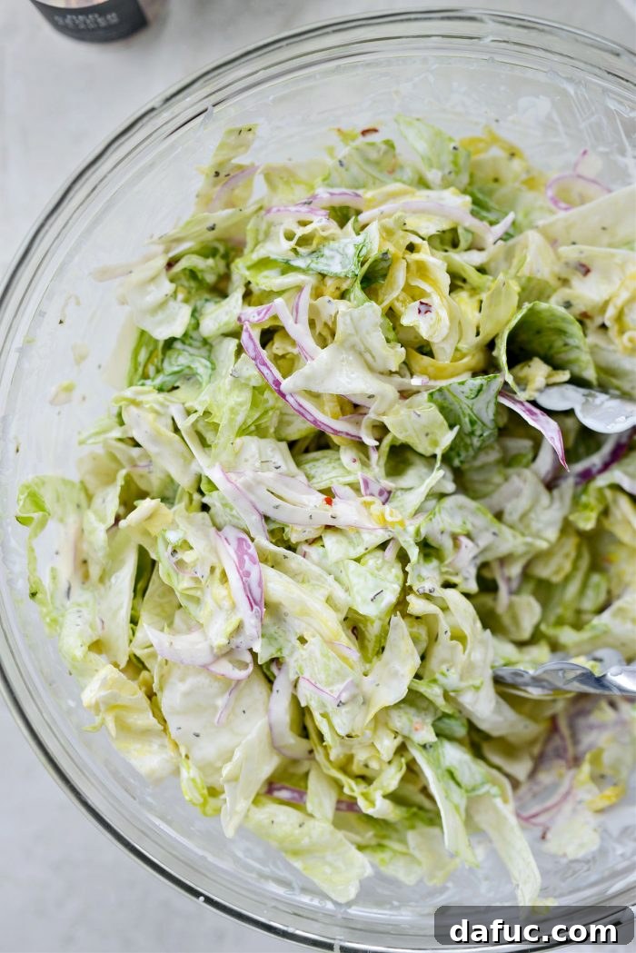 Old World Italian Sub 11 The grinder salad ingredients thoroughly tossed and coated in the creamy dressing.