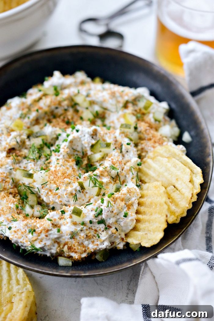 Fried Pickle Ranch Dip served with a variety of dippers including potato chips and pretzels