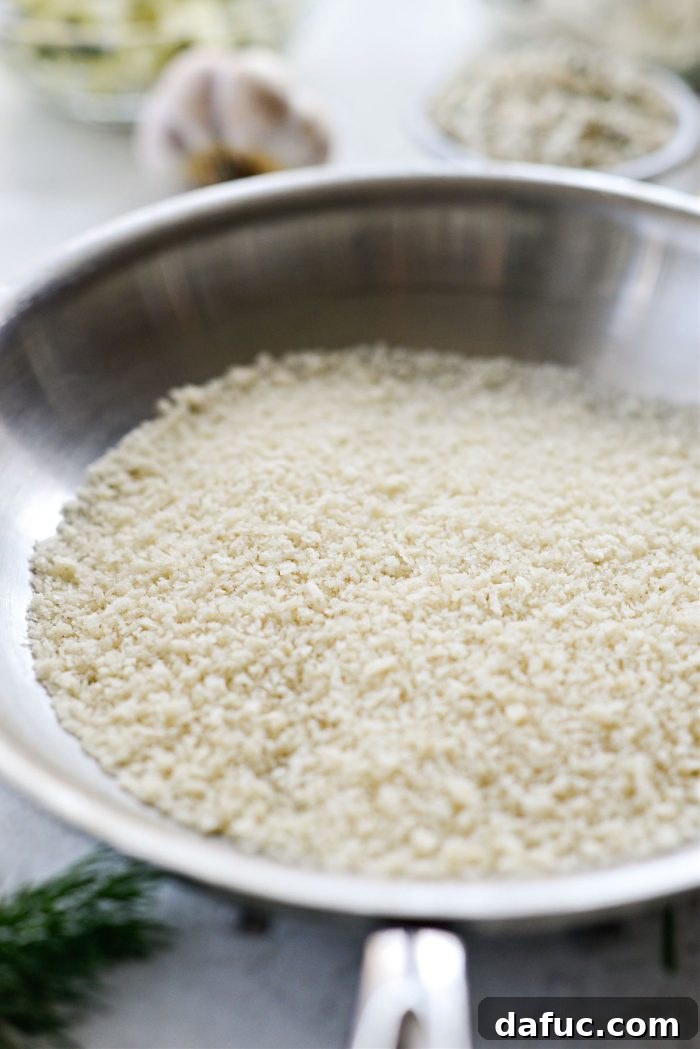Southern Fried Pickle Ranch Dip 5 Adding panko breadcrumbs to a dry skillet