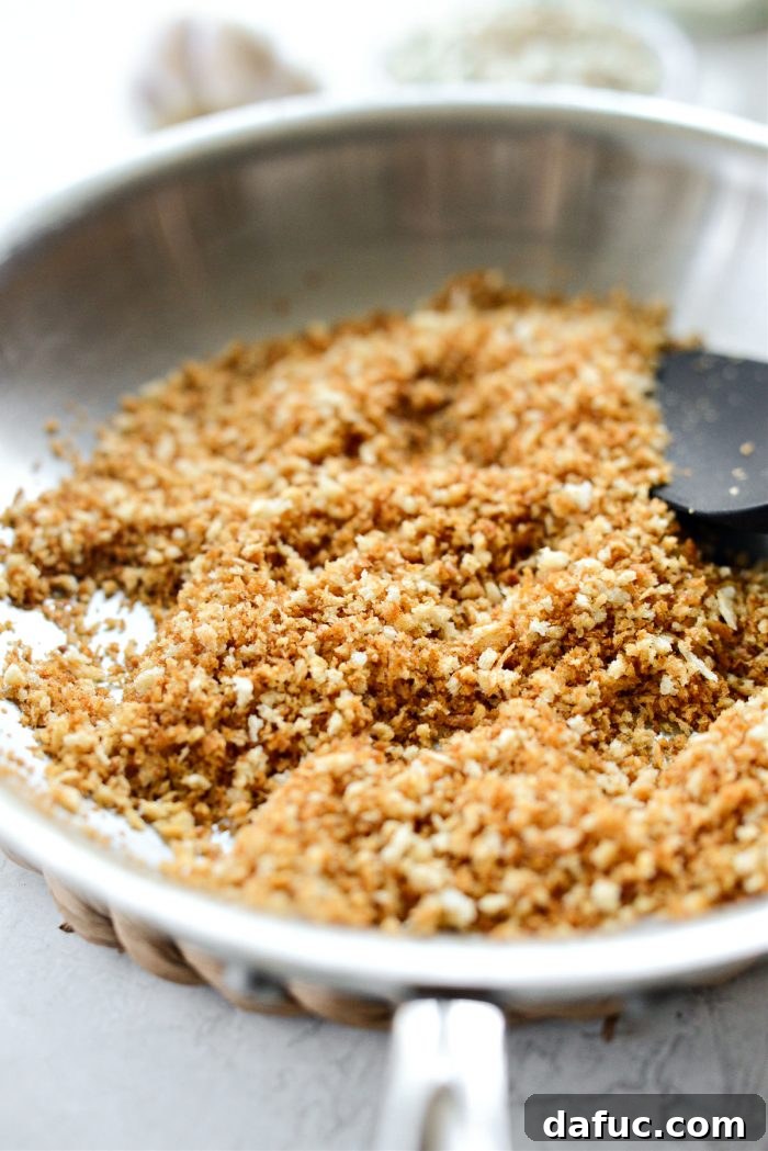 Toasting panko breadcrumbs until they turn deeply golden brown