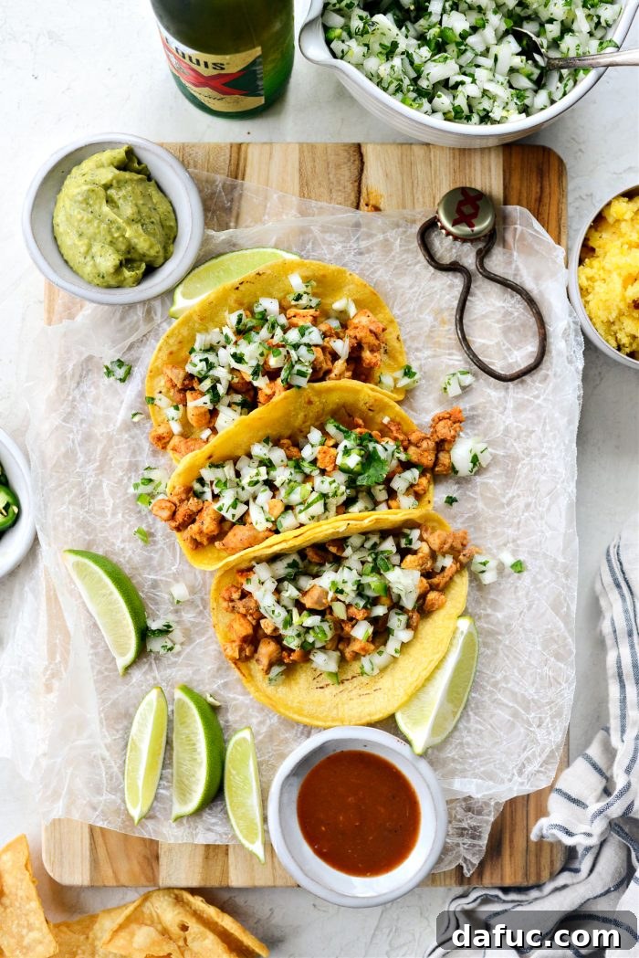 A perfectly assembled Chicken Street Taco, ready to be enjoyed