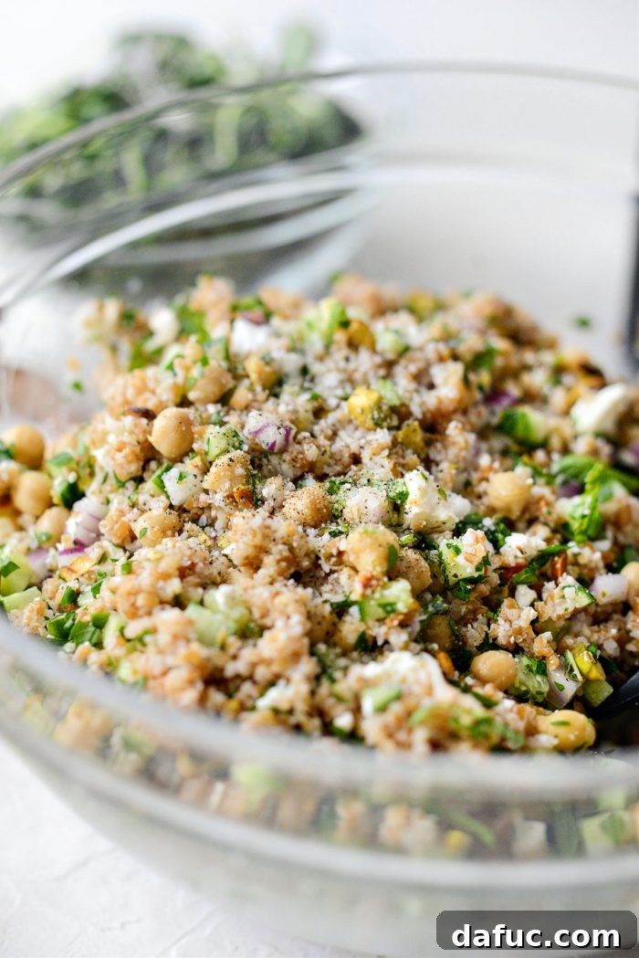 Seasoning the Jennifer Aniston Salad with salt and pepper