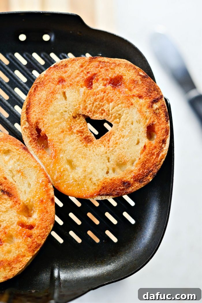 Sweet & Spicy Bagel with Zesty Chive Cream Cheese 13 A perfectly toasted honey sriracha bagel half