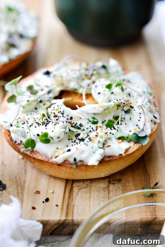 Sweet & Spicy Bagel with Zesty Chive Cream Cheese 17 A completed Honey Sriracha Toasted Bagel, ready to be eaten