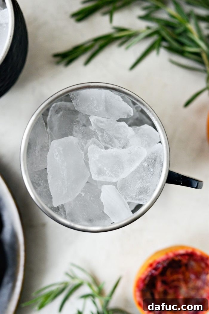 Crimson Blood Orange Mule 6 add ice to mugs