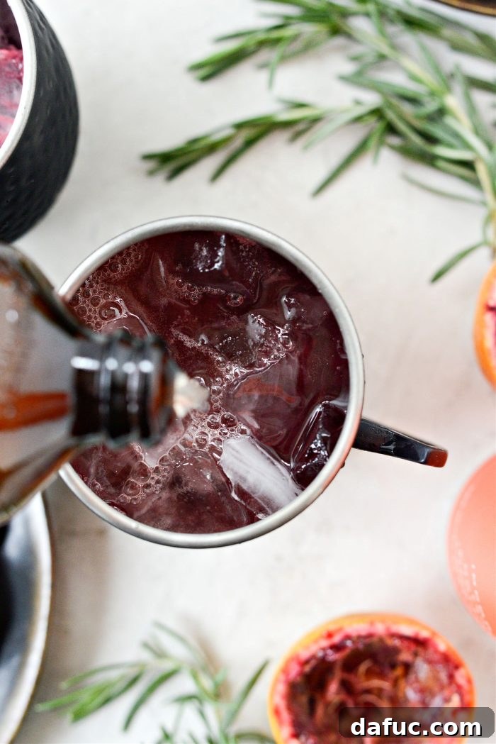 Crimson Blood Orange Mule 9 adding ginger beer