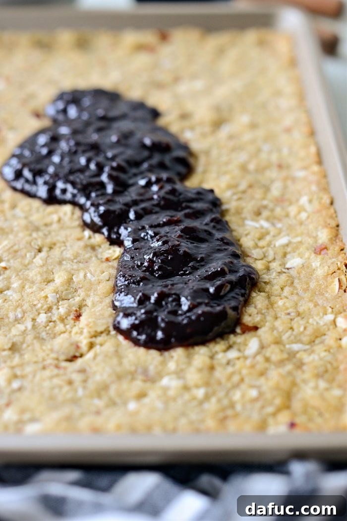 Blackberry Almond Crumble Bars 15 Warm blackberry jam spread over the partially baked streusel crust