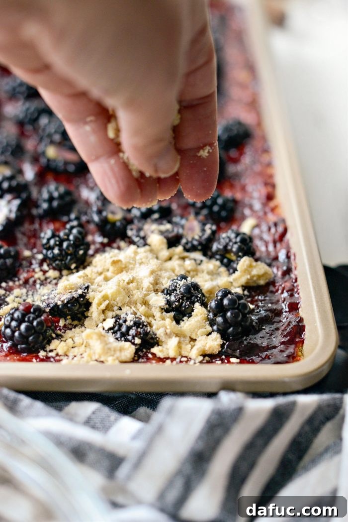 Blackberry Almond Crumble Bars 17 Reserved streusel topping sprinkled over fresh blackberries