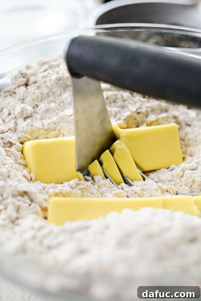 Blackberry Almond Crumble Bars 8 Using a pastry cutter to incorporate butter into dry streusel mix