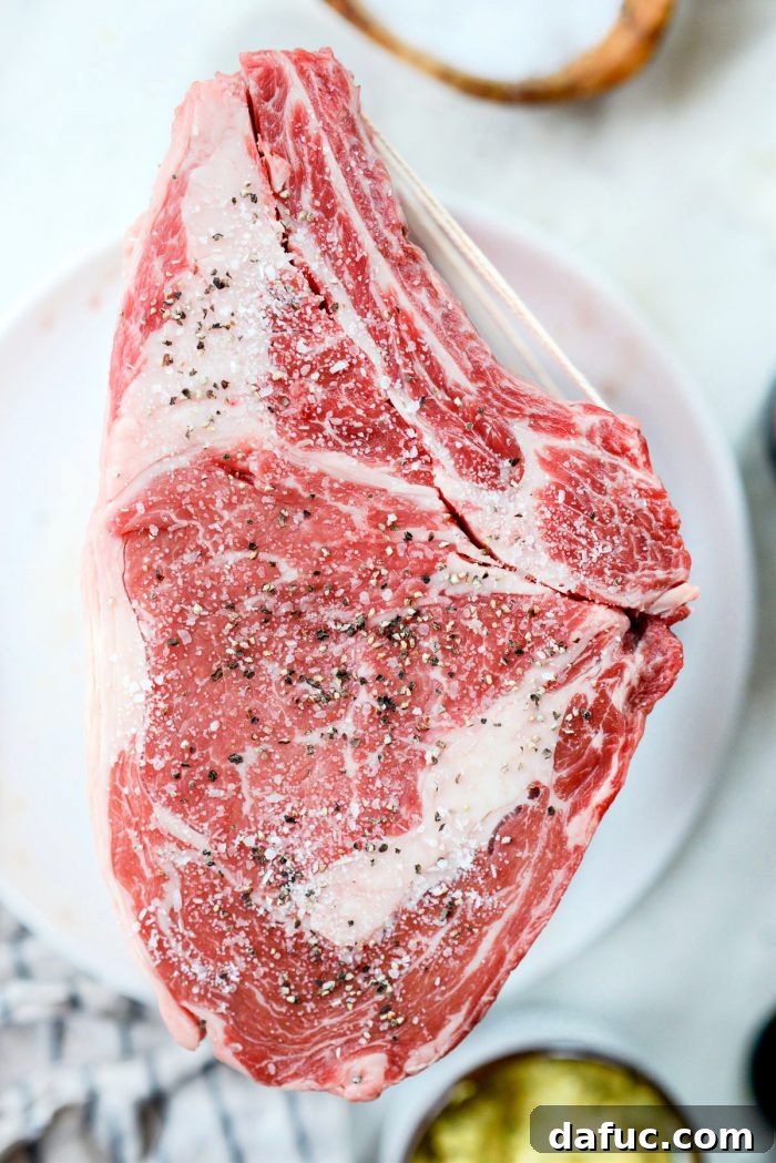 Rosemary Dijon Crusted Prime Rib with Pinot Noir Au Jus 13 Rib roast seasoned generously with kosher salt and black pepper.