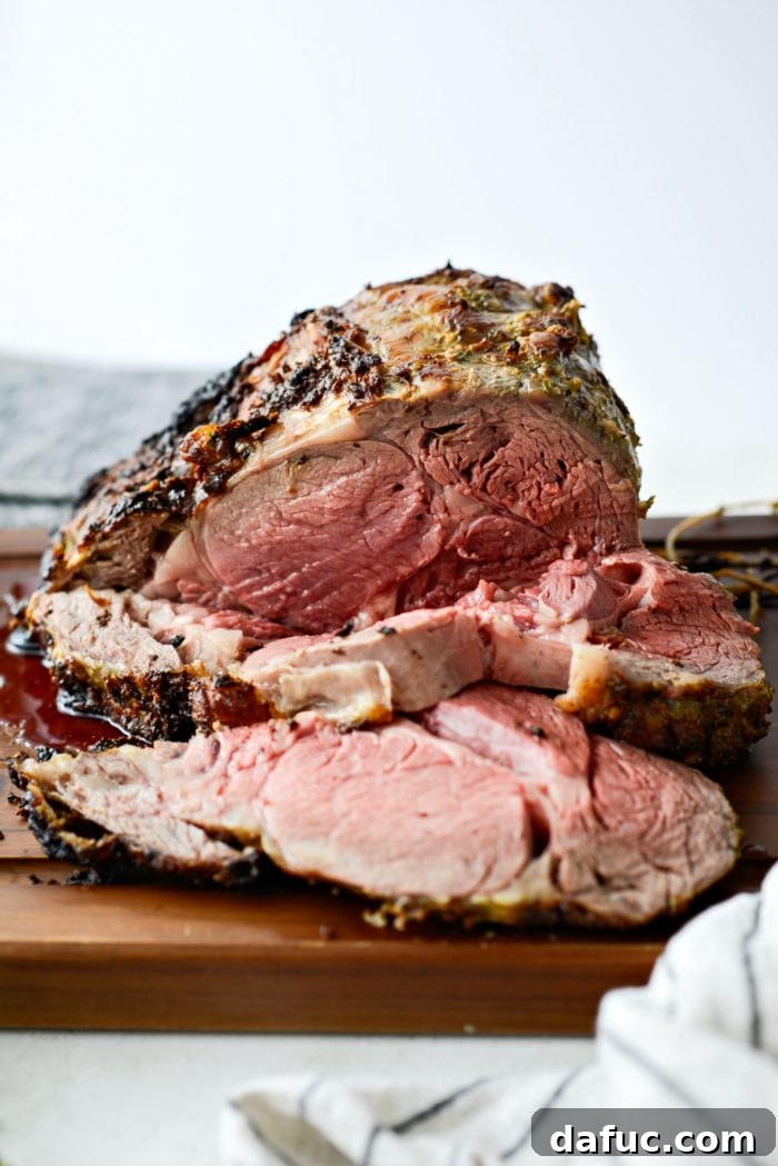 Rosemary Dijon Crusted Prime Rib with Pinot Noir Au Jus 24 Slicing the Dijon rosemary crusted prime rib.