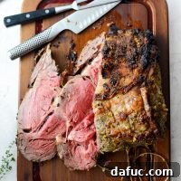 Prime Rib Roast on a black plate.