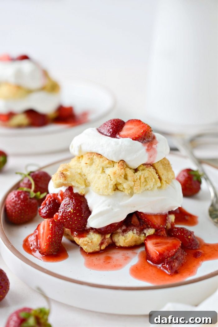 Perfectly assembled Homemade Strawberry Shortcake, ready to be enjoyed.