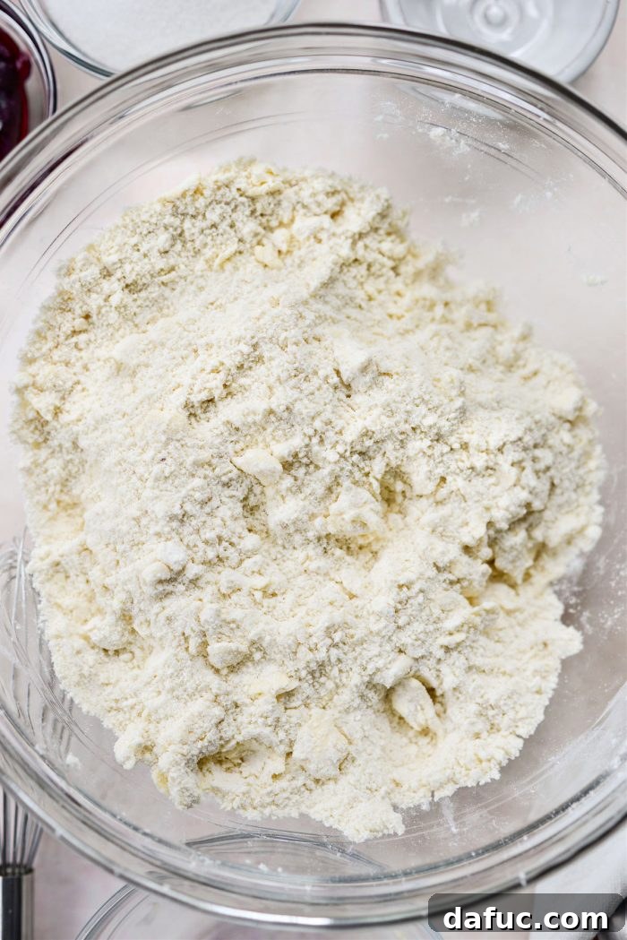 Flour and butter mixture with pea-sized clumps, ready for buttermilk.