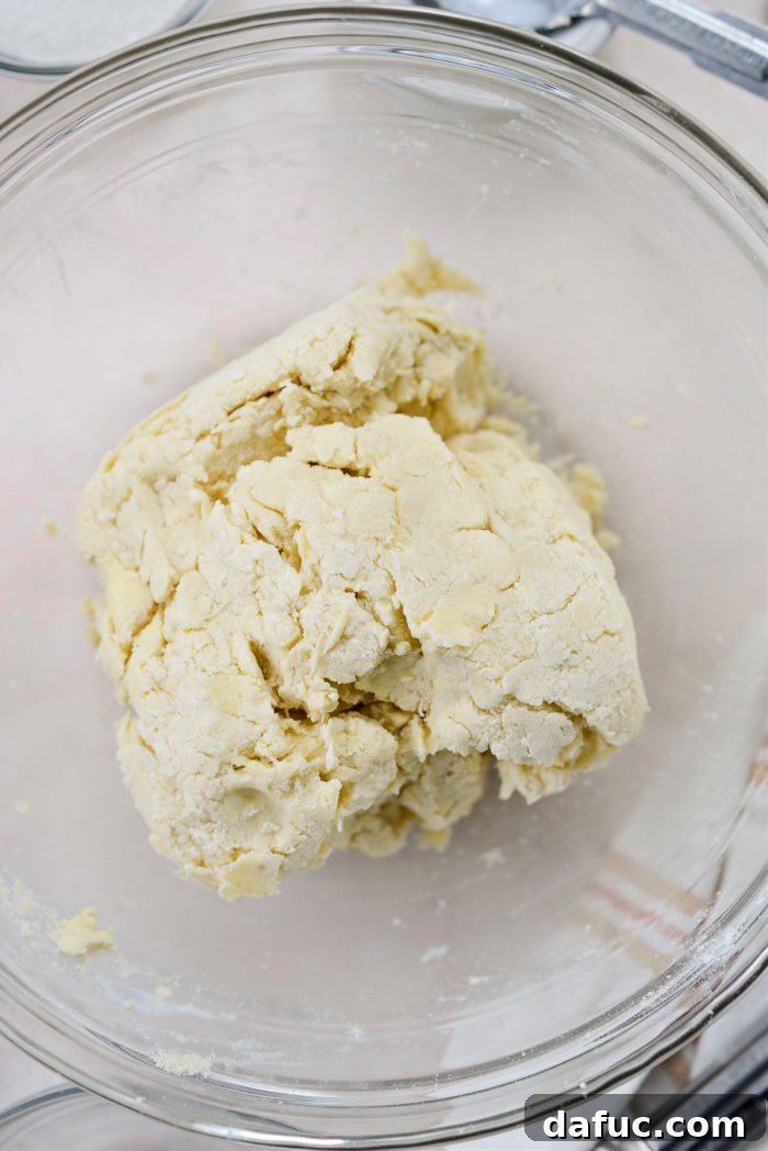 Freshly Baked Strawberry Dream 10 Mixing buttermilk into dough until just combined