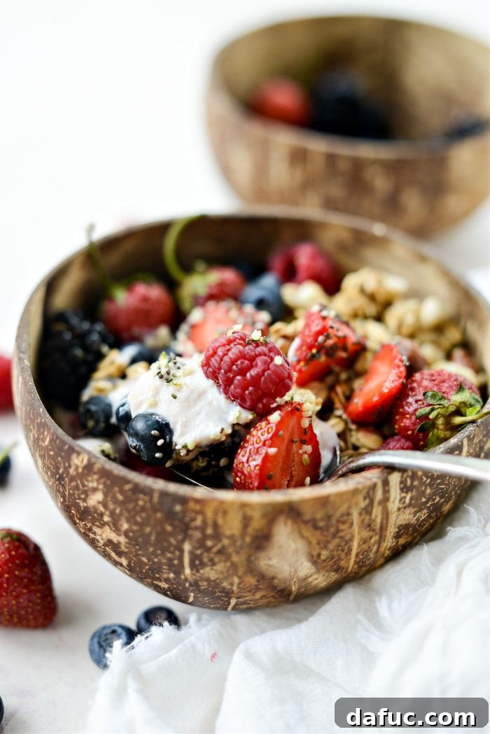 Decadent Strawberry Cheesecake Granola Bowl 12 Close-up of a beautifully assembled Strawberry Cheesecake Granola Bowl