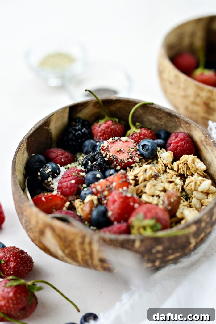 Decadent Strawberry Cheesecake Granola Bowl 3 Delicious Strawberry Cheesecake Granola Bowl with fresh berries