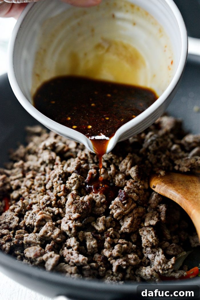 Fragrant Thai Basil Beef 12 pour in sauce