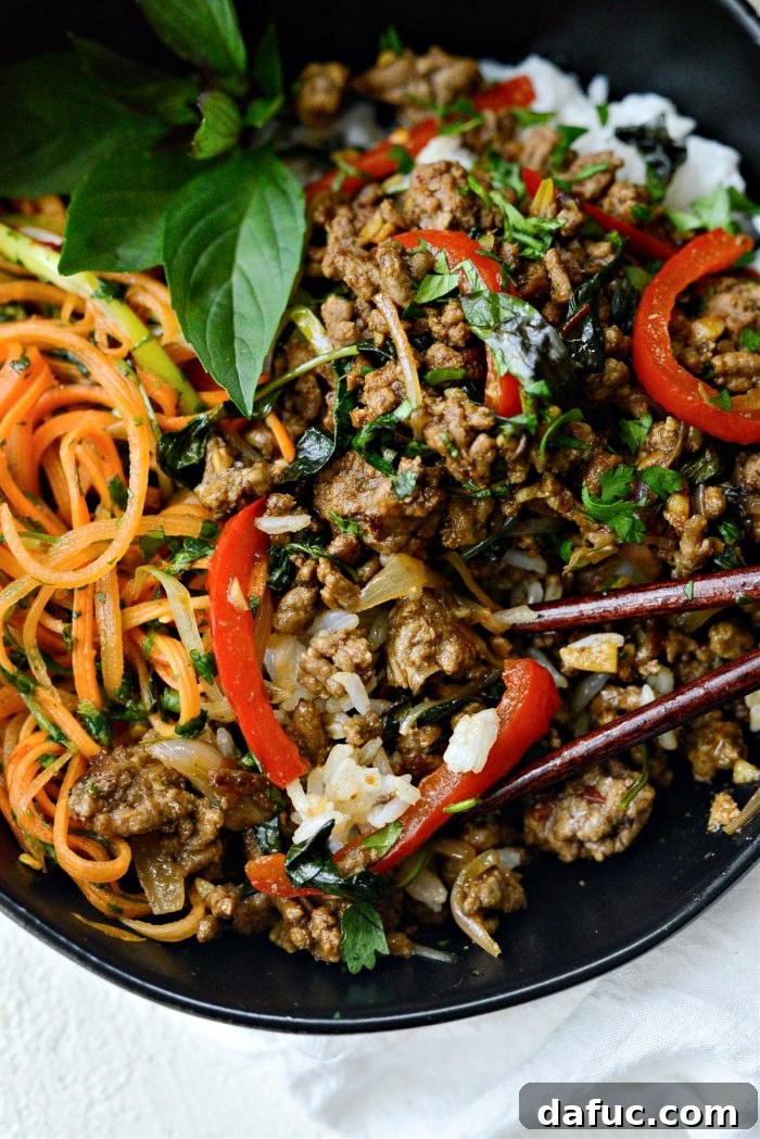 Final close-up of Thai Basil Beef with vibrant basil leaves