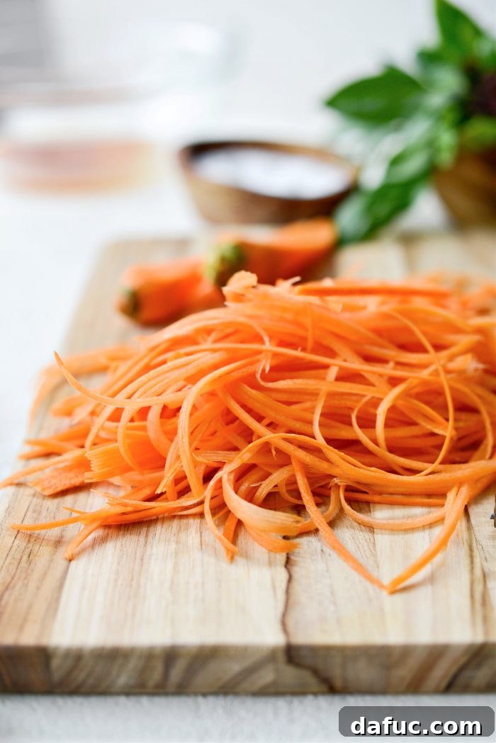 Vibrant Thai Carrot Slaw 6 Perfectly julienned carrots, ready for the slaw.