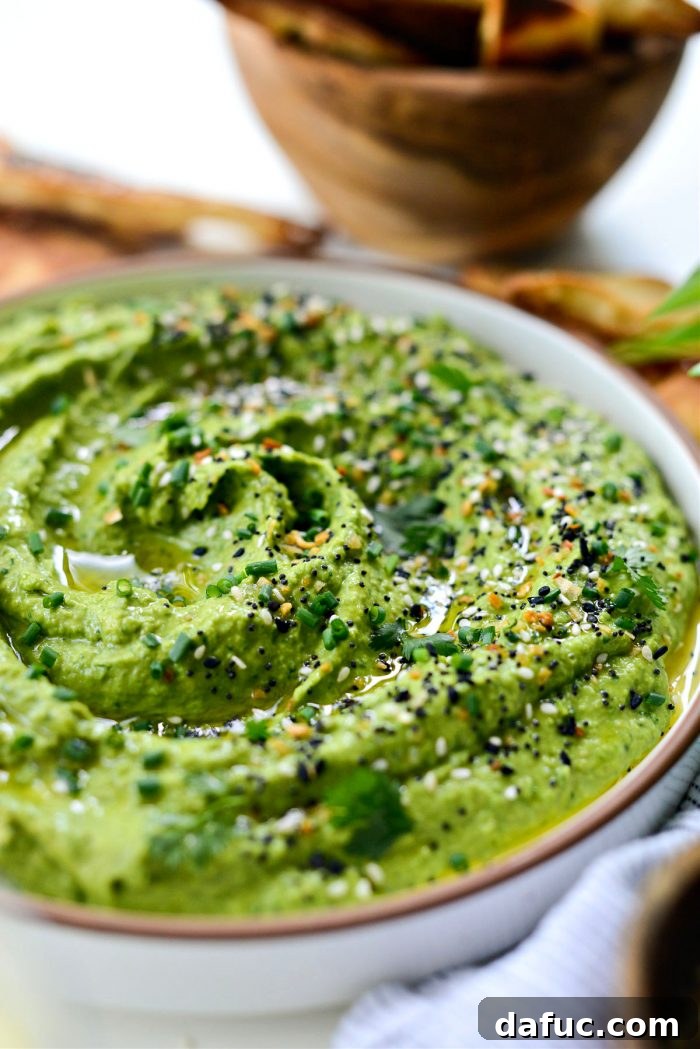 Vibrant Green Goddess Hummus 3 Close-up of Green Goddess Hummus, beautifully textured and ready to serve