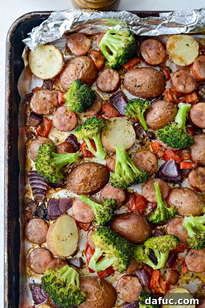 Perfectly roasted Sheet Pan Andouille Sausage and Vegetables, still on the pan