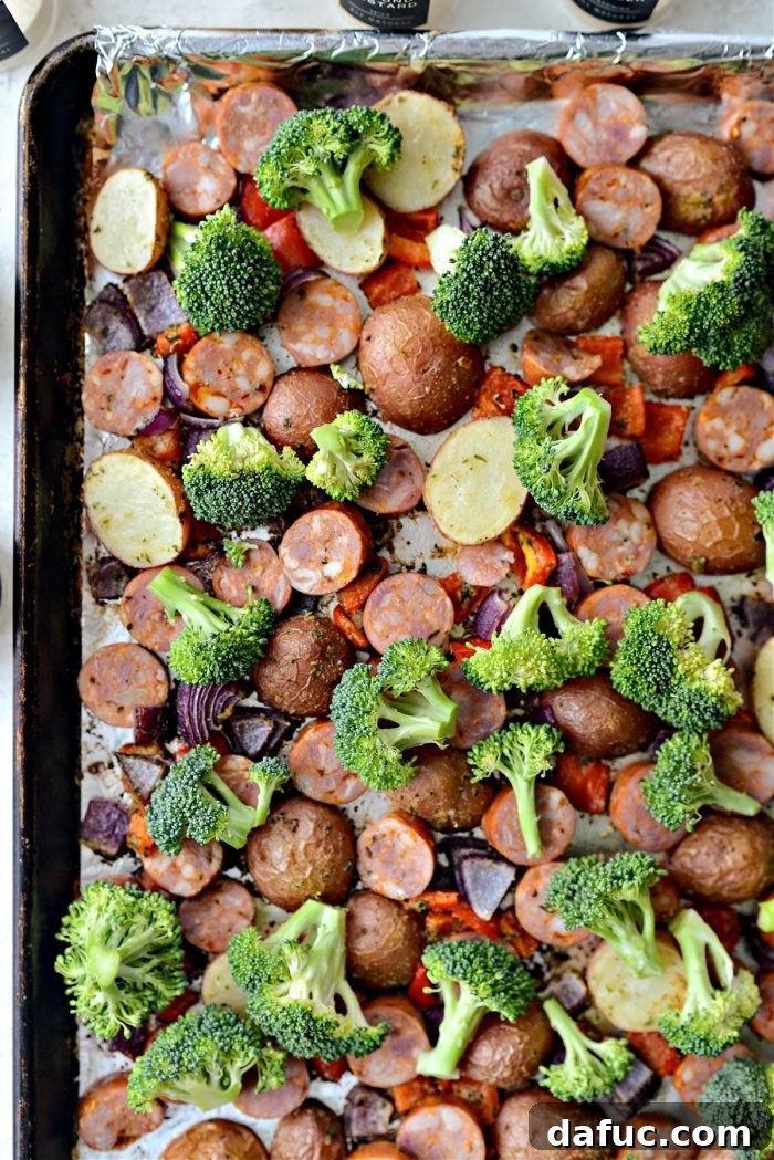 Add broccoli florets to the sheet pan and spray with oil