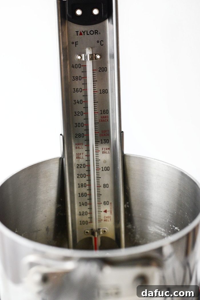 Sweet & Simple Homemade Caramel Apples 9 attach candy thermometer to saucepan