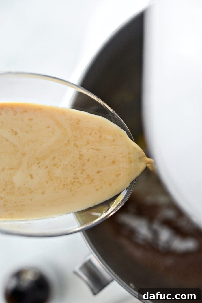 Decadent Chocolate Cloud 9 pouring in a little vanilla and milk