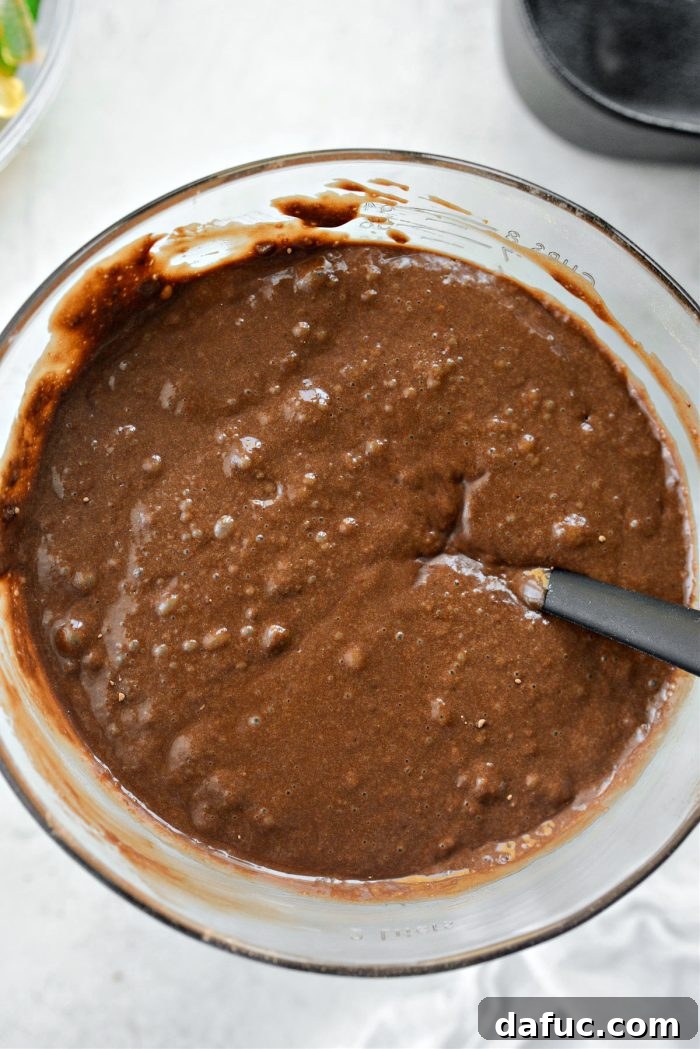 Decadent Chocolate Garden Delight 15 Smooth, rich chocolate cake batter in a mixing bowl